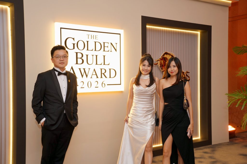 Envicion Studio representatives posing at the Golden Bull Award 2026 backdrop