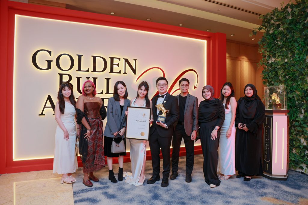 Envicion Studio team receiving the Golden Bull Award 2026 on stage