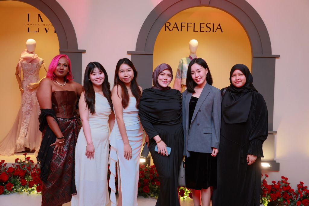 Envicion Studio team members celebrating together at the awards gala dinner